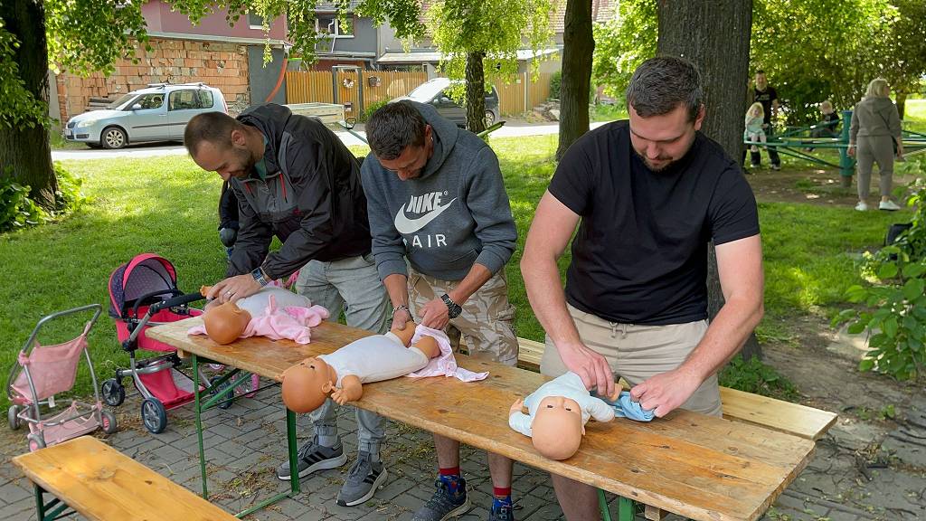 Den rodiny u rybníka